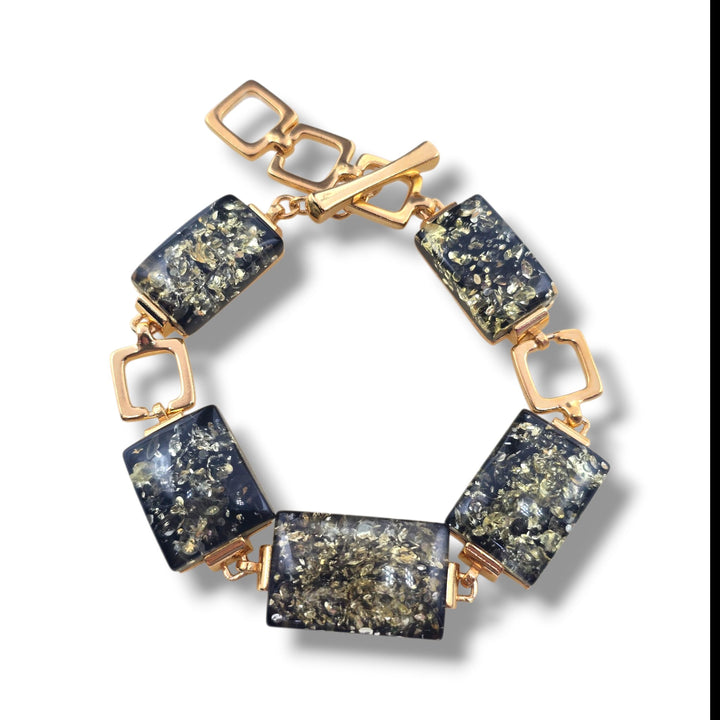 Bracciale quadrato di ambra multicolore montato in argento dorato