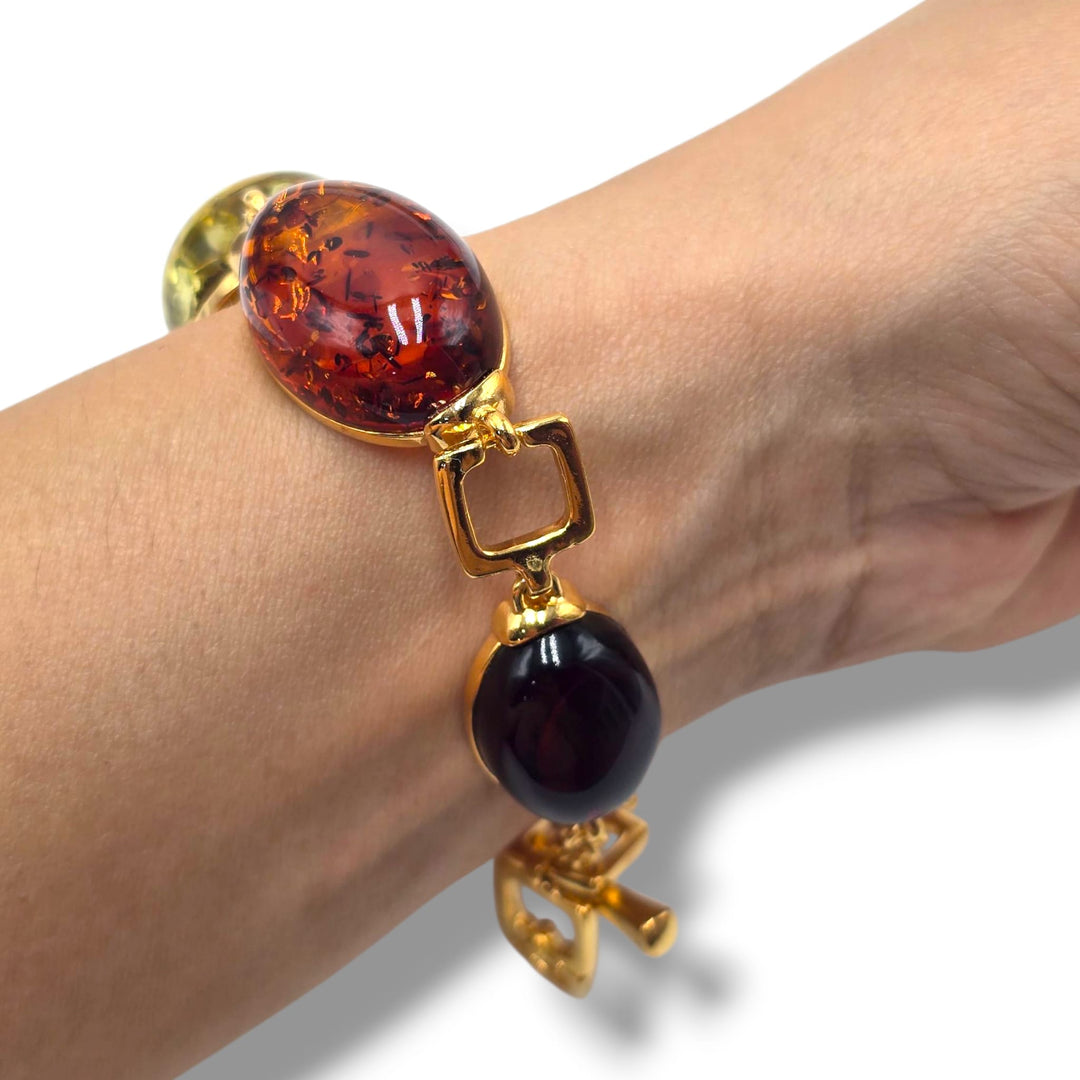 Bracciale quadrato di ambra multicolore montato in argento dorato