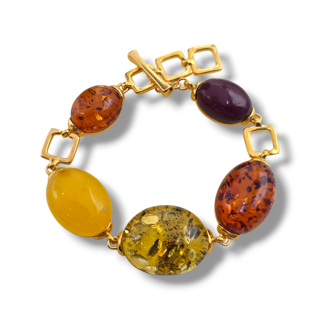 Bracciale quadrato di ambra multicolore montato in argento dorato