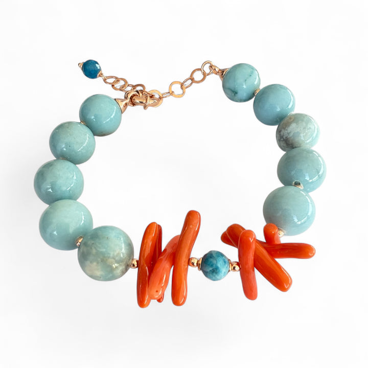 Bracciale di corallo e larimar montato in argento ramato