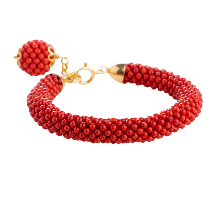 Woven red coral bracelet mounted on silver