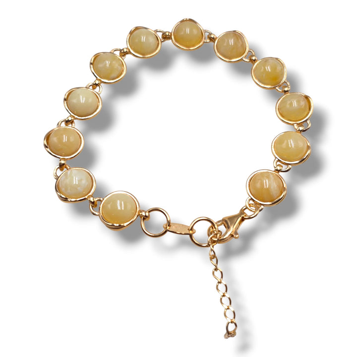 Bracciale tondi di ambra del baltico montate in argento dorato
