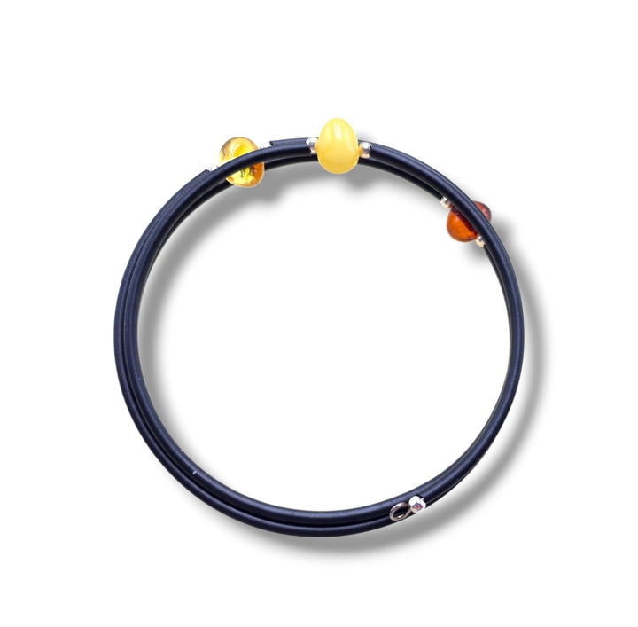Bracciale tris di ambre montate in caucciù e acciaio