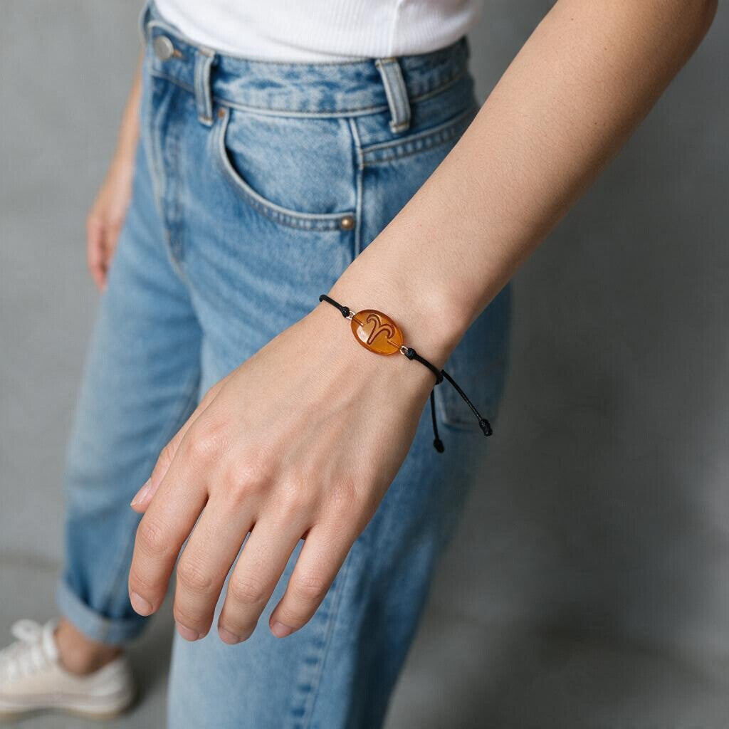 Bracciali Segni zodiacali di Ambra montati in Acciaio