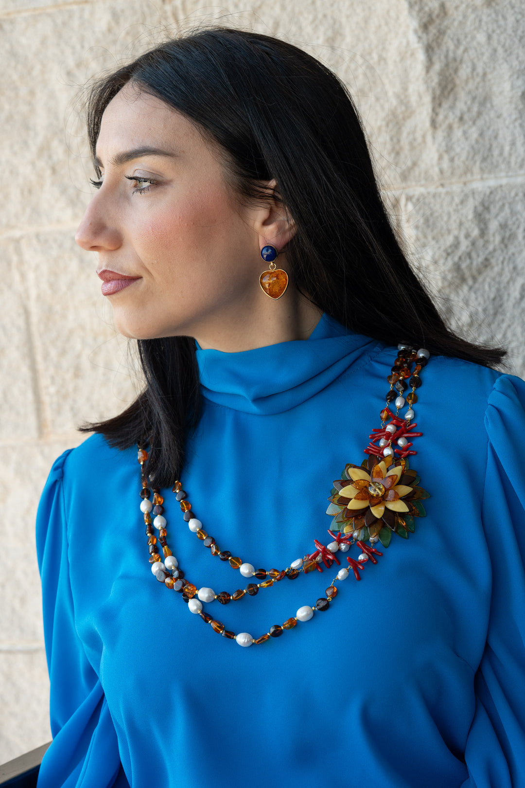 Collana "fiore ambra" montato su perle e corallo in argento