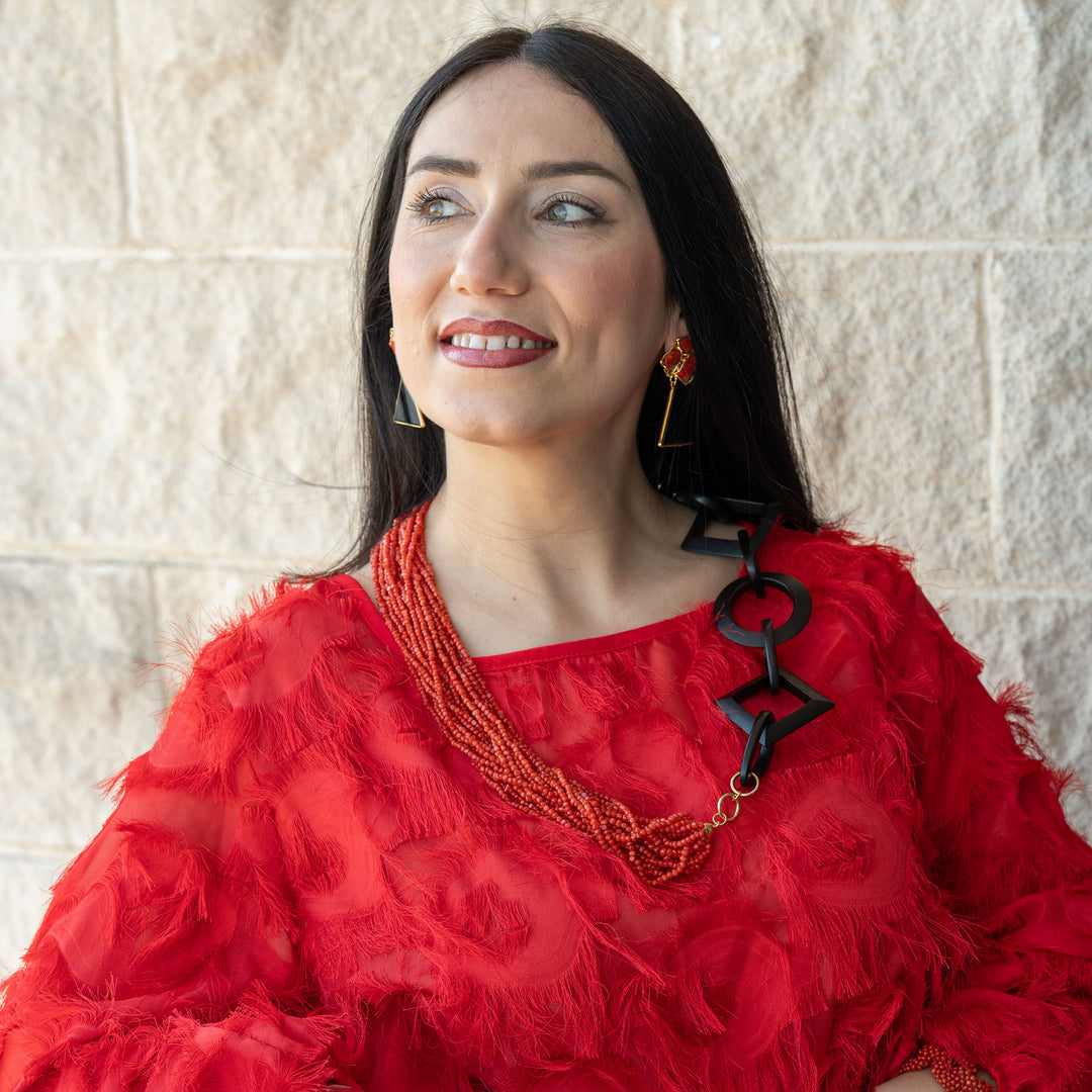 Collana corallo ed ebano montato su argento placcato oro