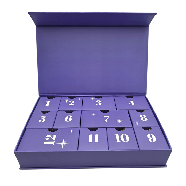 Calendario dell’avvento con 12 gioielli in corallo, cammeo, argento e bigiotteria