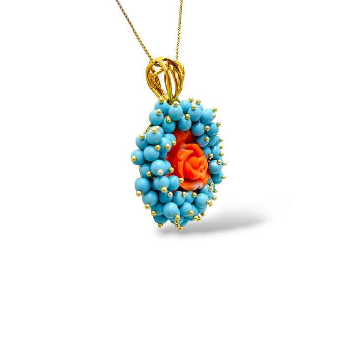 Collana ciondolo rosa in corallo montata in argento dorato