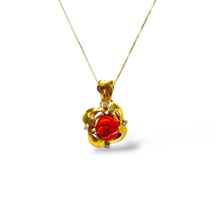 Pink coral pendant necklace set in gold-plated silver