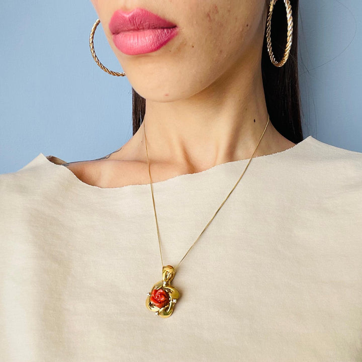 Pink coral pendant necklace set in gold-plated silver