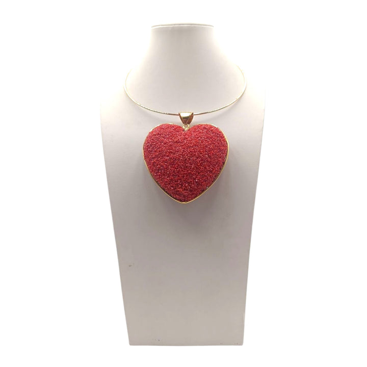 Ciondolo Cuore di Corallo rosso montato in Argento Dorato