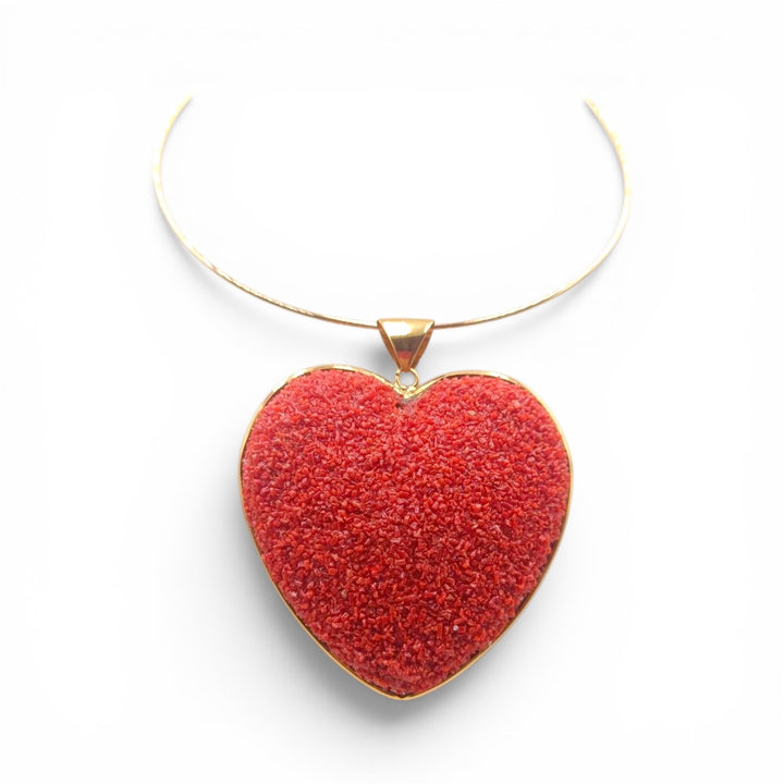 Ciondolo Cuore di Corallo rosso montato in Argento Dorato