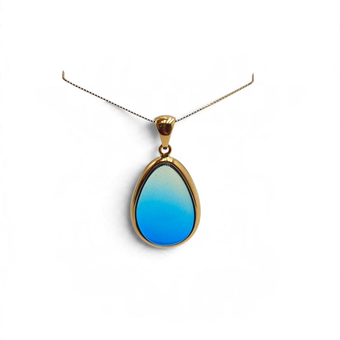 Ciondolo Goccia di Ambra blu montato in Argento Dorato