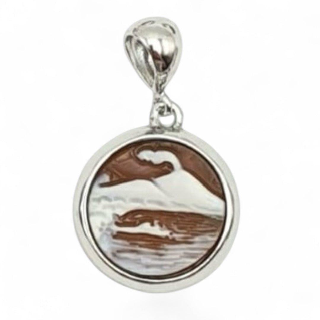 Neapolitan cameo charm pendants mounted in silver