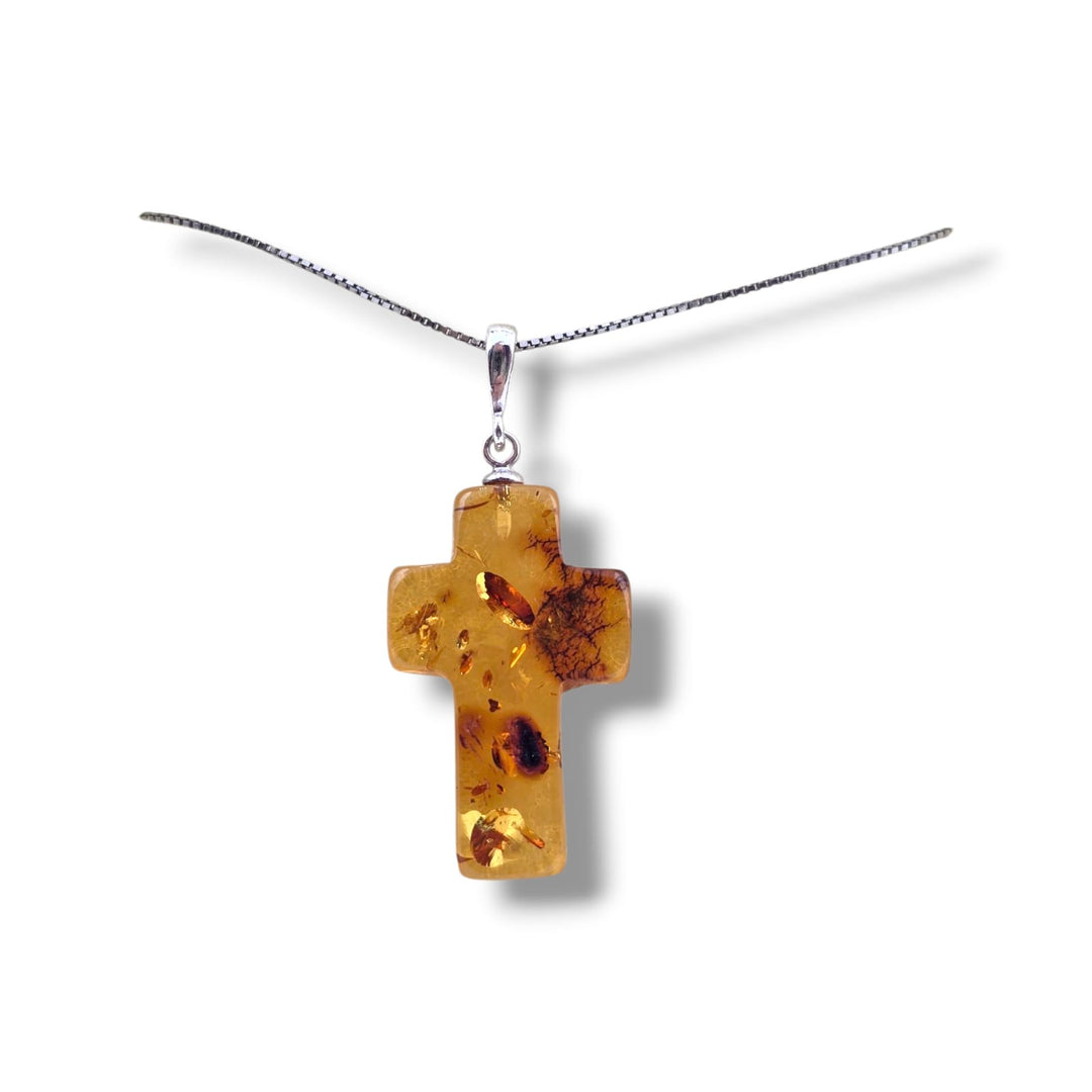 Ciondolo croce di ambra montato in argento