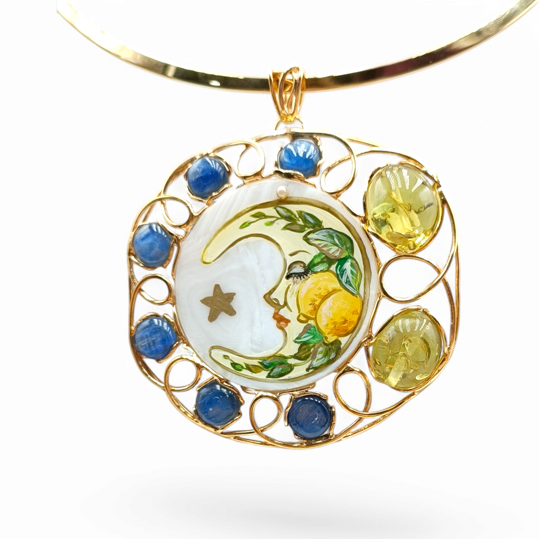 Mother of pearl moon pendant mounted on silver