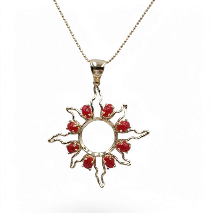 Collana ciondolo sole in corallo montati in argento