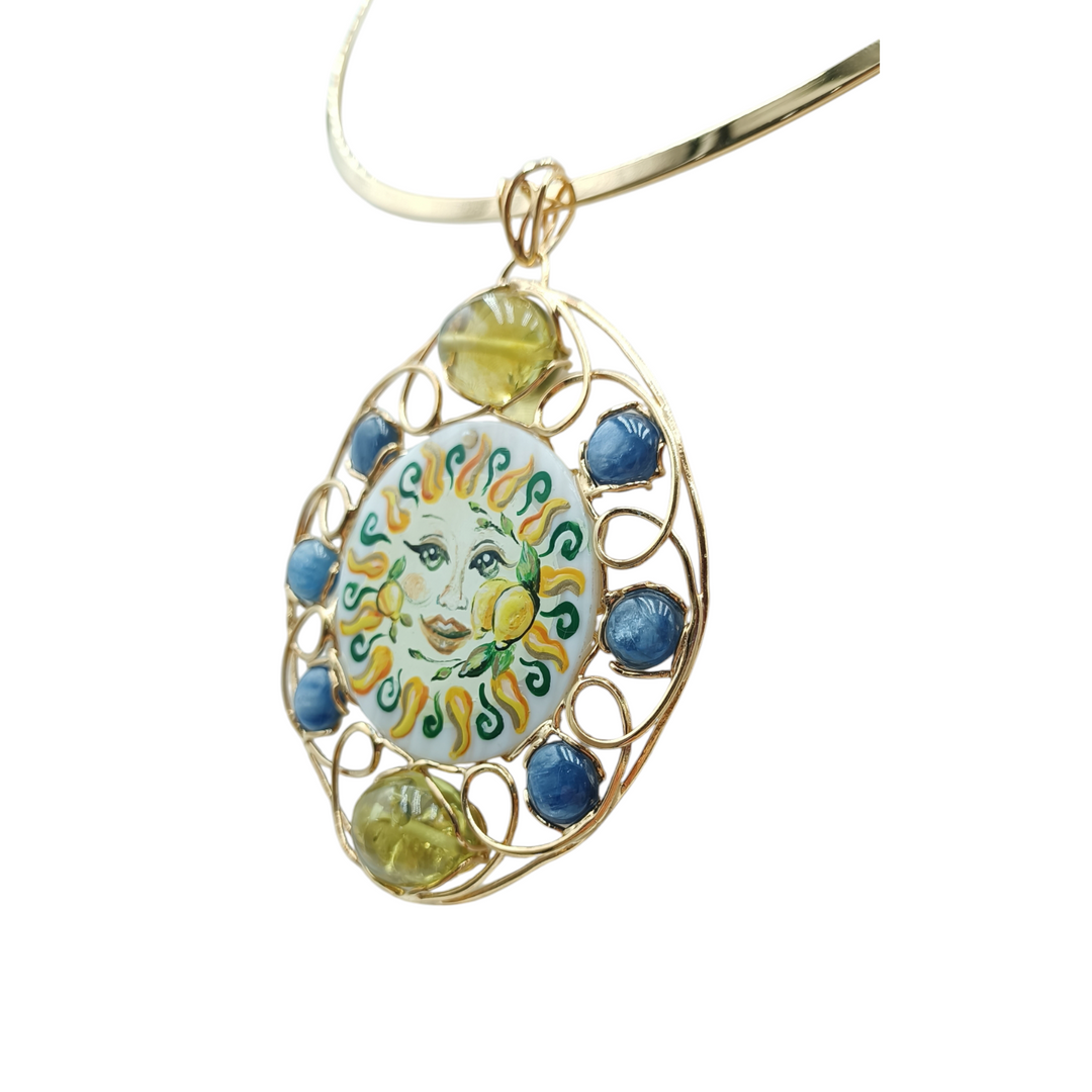 Mother of pearl sun necklace mounted in silver, kyanite and green amber