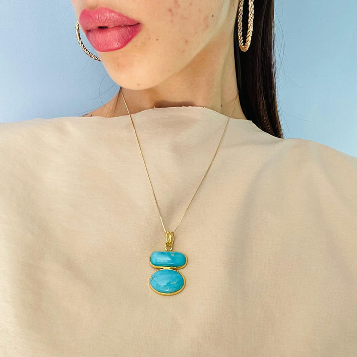 Pendant in real turquoise mounted on silver