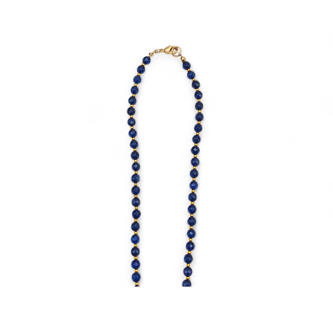 Collana con Fiore e Perle di Ambra blu montata in Ematite Dorata