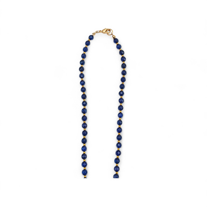 Collana con Fiore e Perle di Ambra blu montata in Ematite Dorata