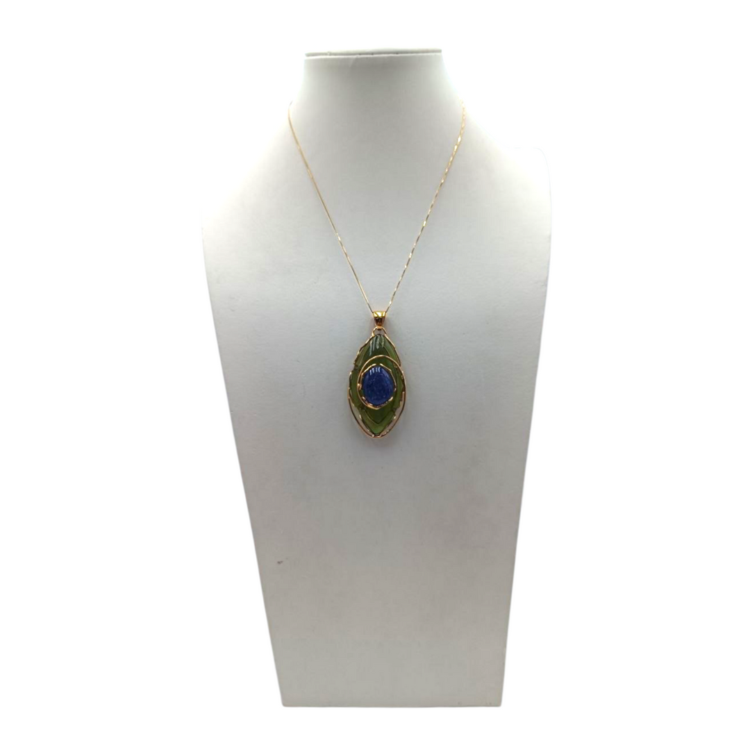 Ciondolo di Ambra Verde e Cianite montata in Argento Dorato