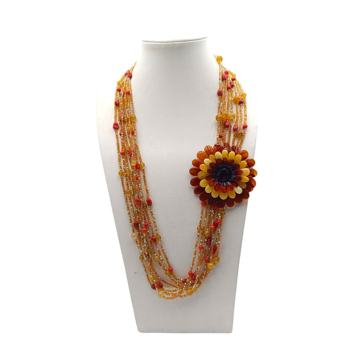 Collana Fiore di Ambra, Corallo e Cristalli montata in Cotone
