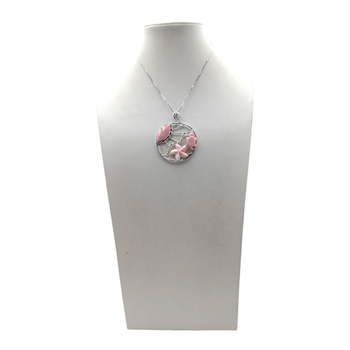 Lucky shell pendant mounted on silver