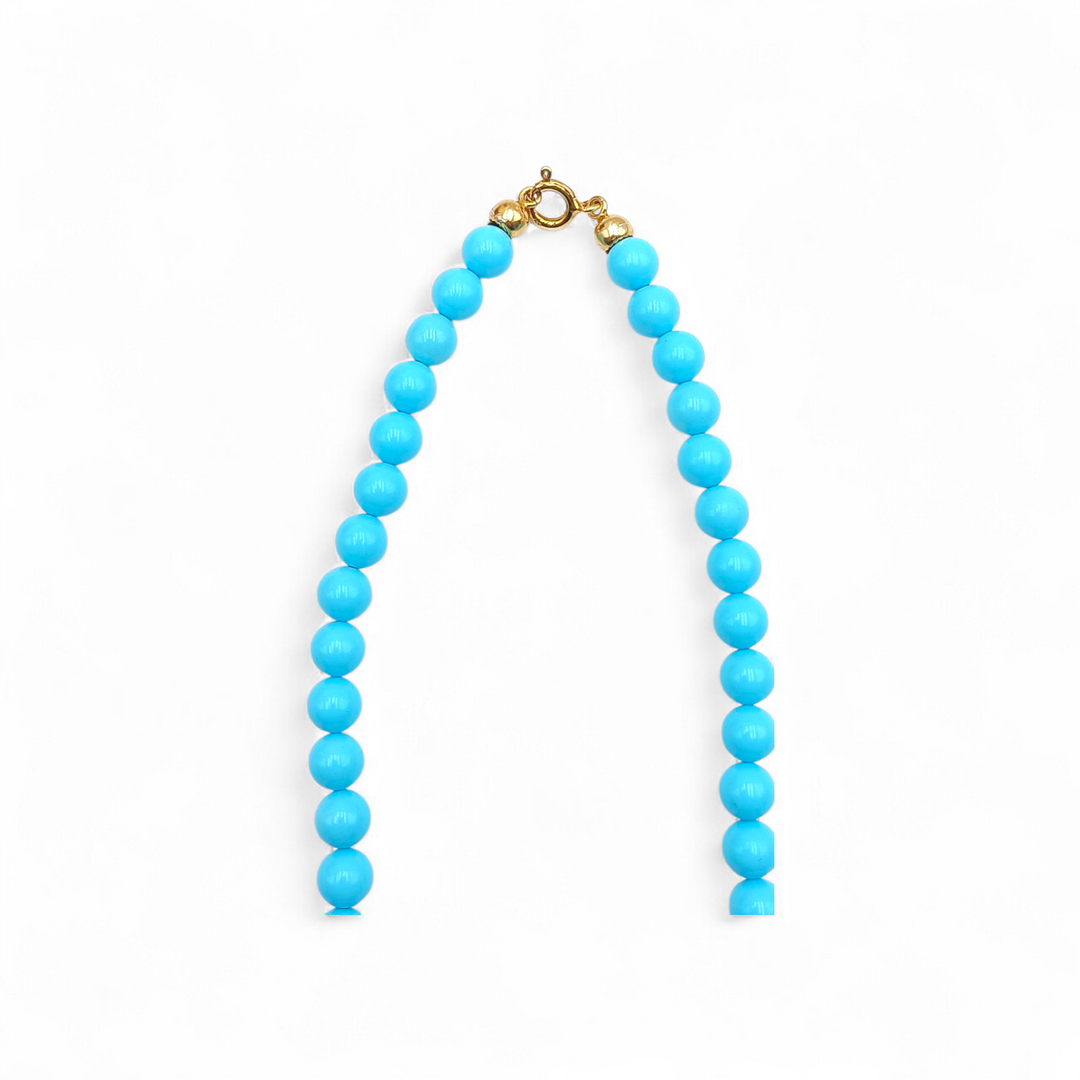 Collana di Pasta di Turchese, di Corallo e Perle di fiume montata in Argento Dorato