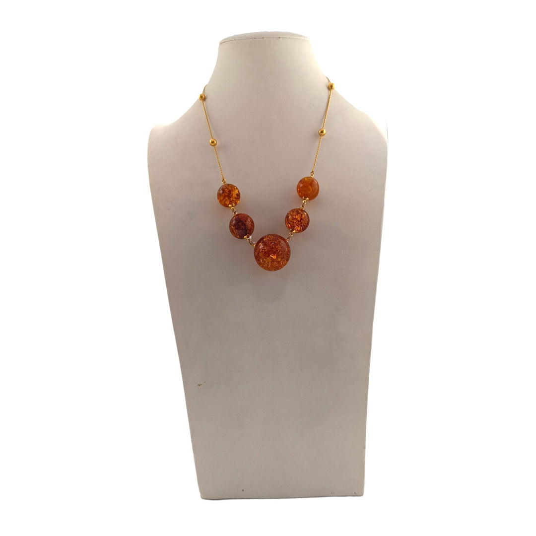 Collana Sfere di Ambra marrone montata in Argento Dorato