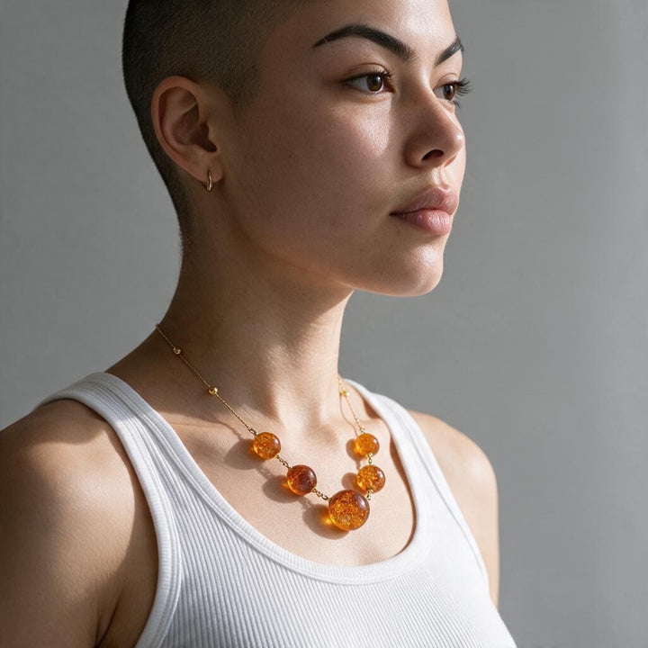Collana Sfere di Ambra marrone montata in Argento Dorato