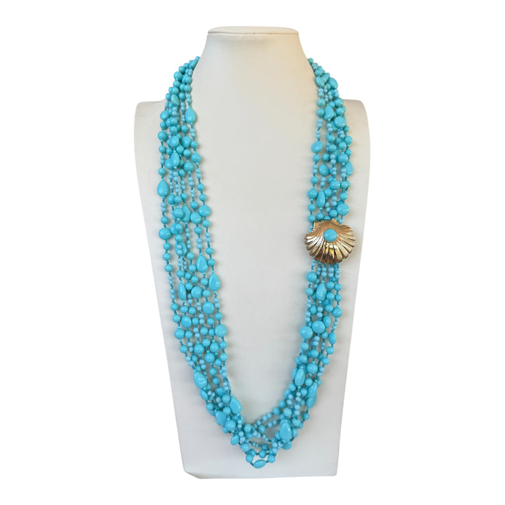 Multi-strand turquoise paste necklace with 4 flowers