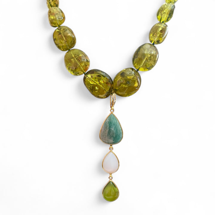 Green amber necklace with green amber, opal, and aquamarine pendant