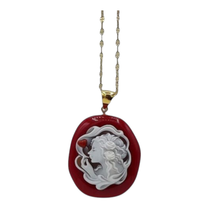 Heart blow pendant on cameo