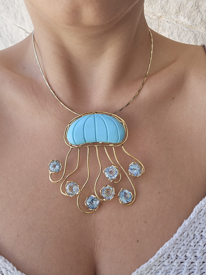 Collana ciondolo “medusa” di pasta di turchese montato in argento