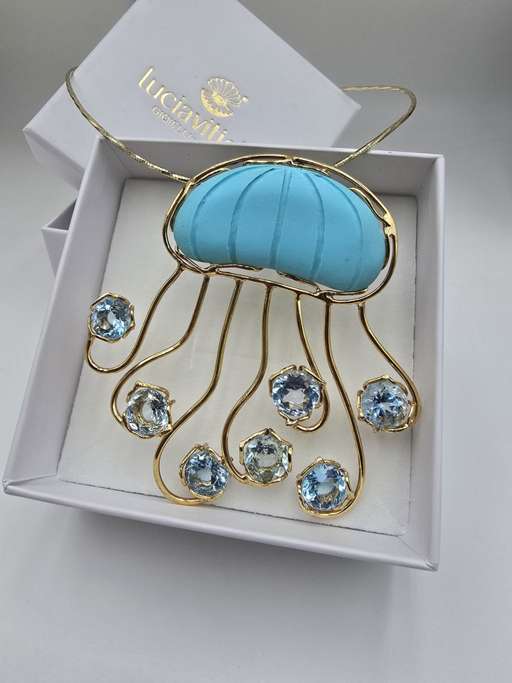 Collana ciondolo “medusa” di pasta di turchese montato in argento