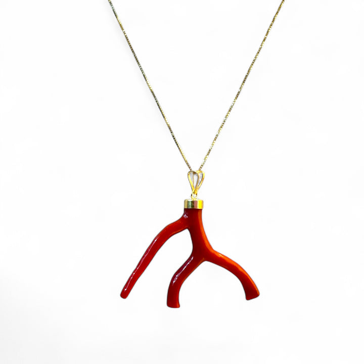 Coral branch pendant necklace mounted on silver