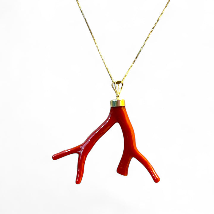 Coral branch pendant necklace mounted on silver