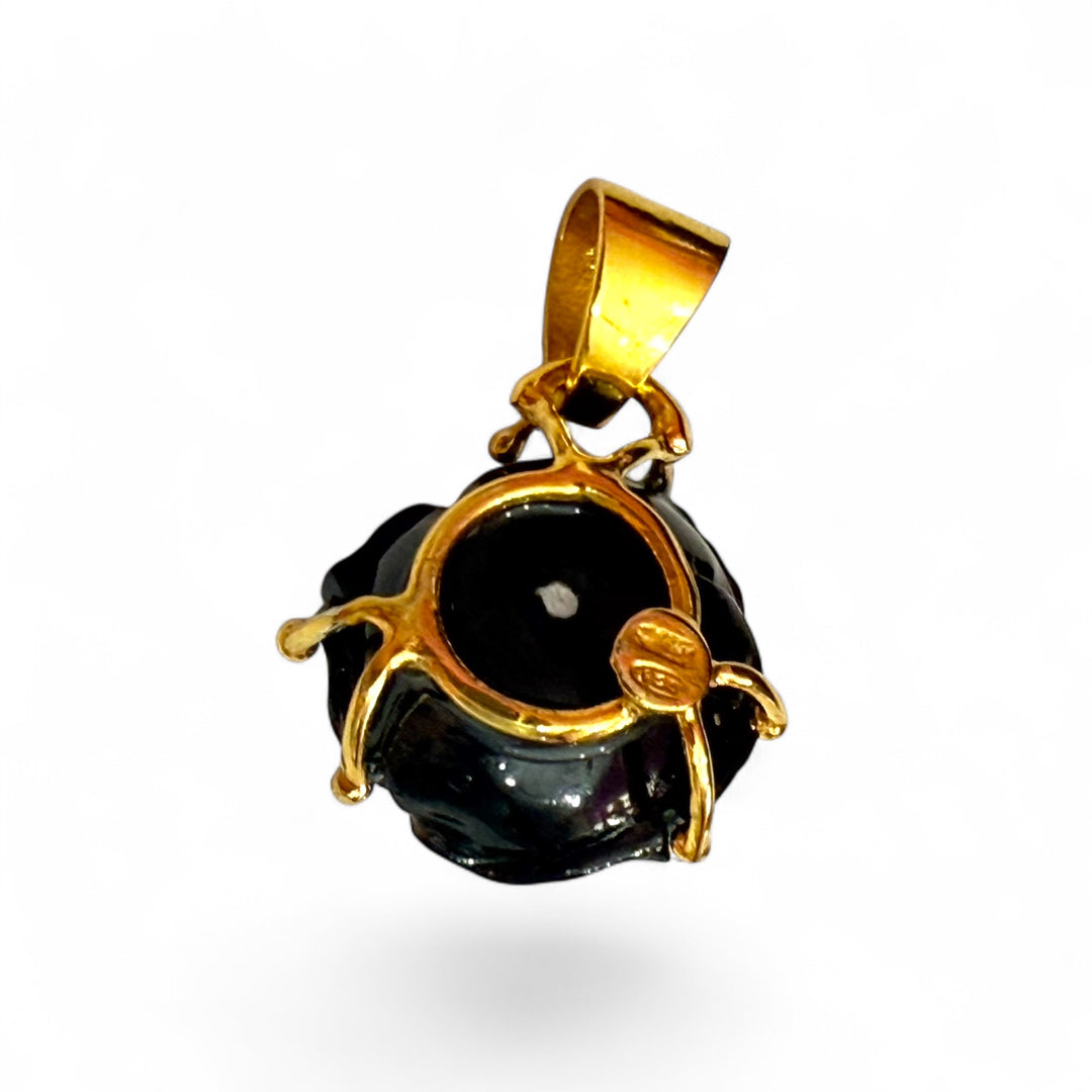 Black coral "black rose" pendant necklace mounted in gold-plated silver