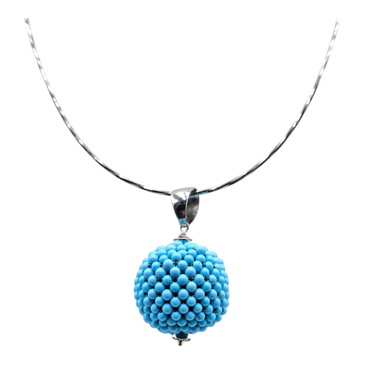 Turquoise paste sphere pendant necklace mounted on silver