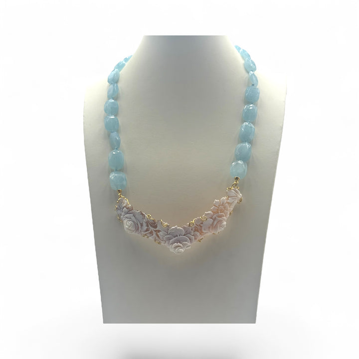 Sardonic cameo necklace set in aquamarine and gilded silver