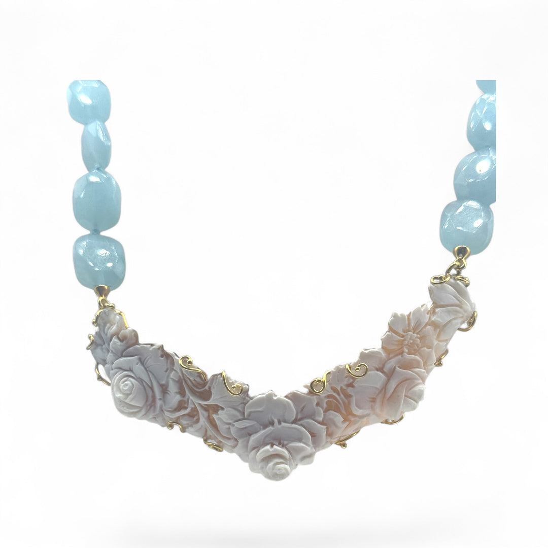 Sardonic cameo necklace set in aquamarine and gilded silver