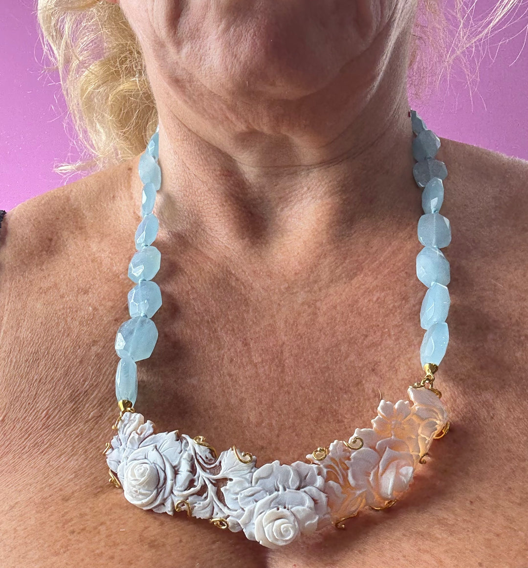 Sardonic cameo necklace set in aquamarine and gilded silver
