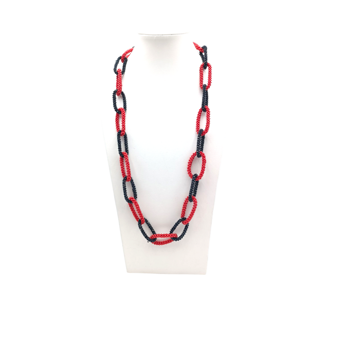 Collana corallo e spinelli in tessito