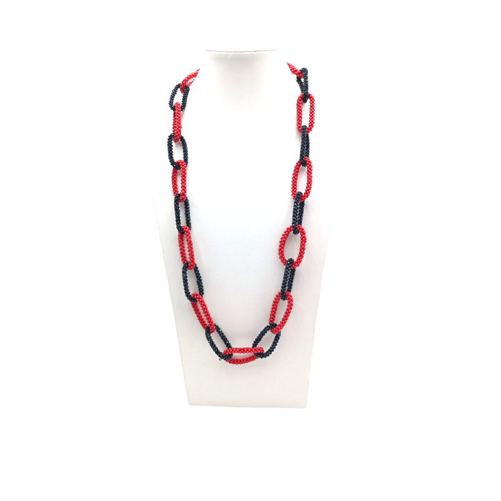 Collana corallo e spinelli in tessito