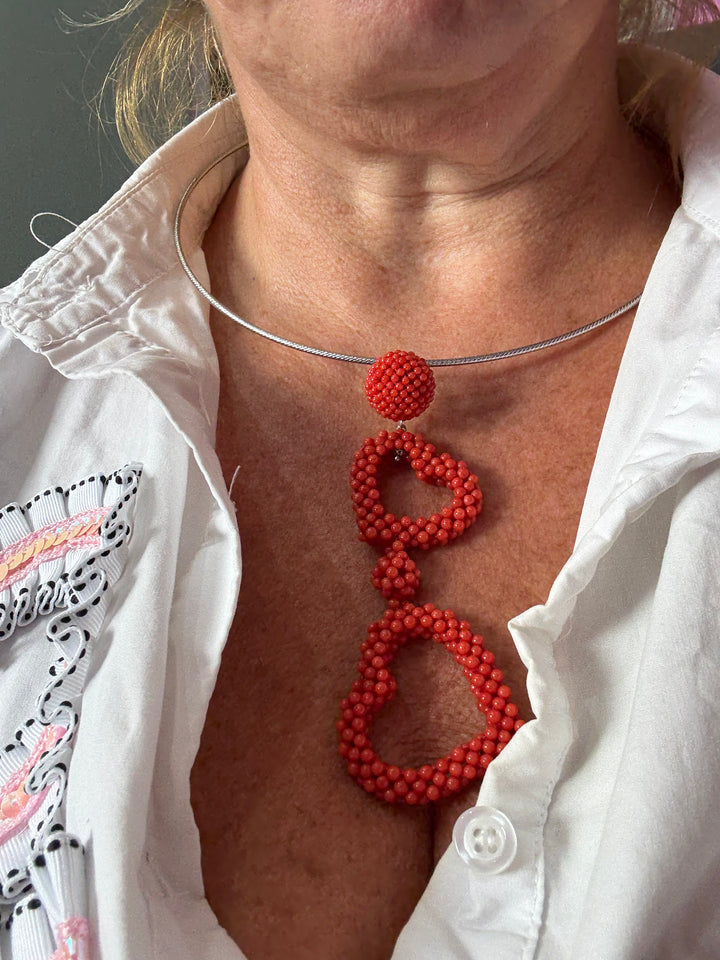 Collana “cuori di tessito” di corallo rosso montato in argento