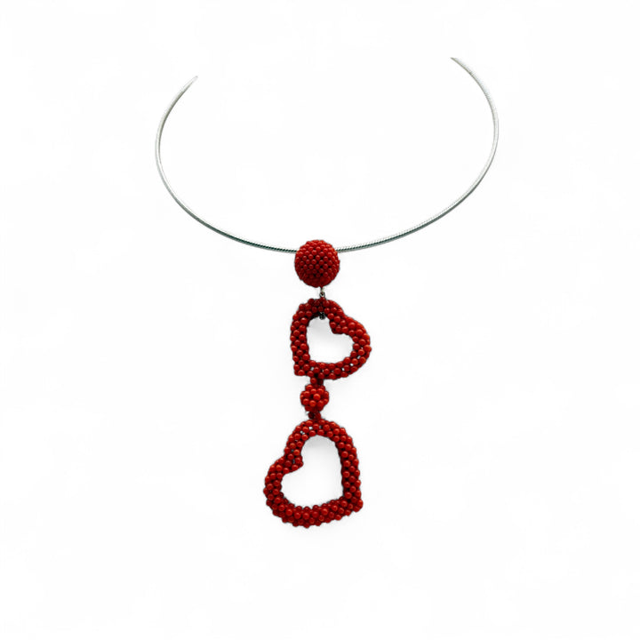 Collana “cuori di tessito” di corallo rosso montato in argento