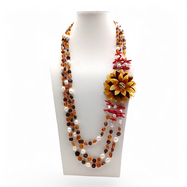 Collana "fiore ambra" montato su perle e corallo in argento