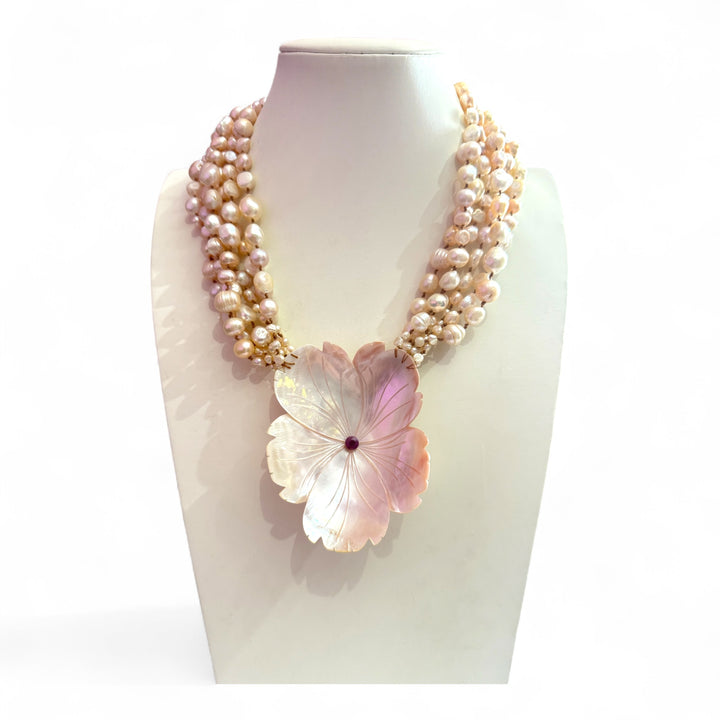 Mother-of-pearl flower necklace with multi-strand pearl necklace