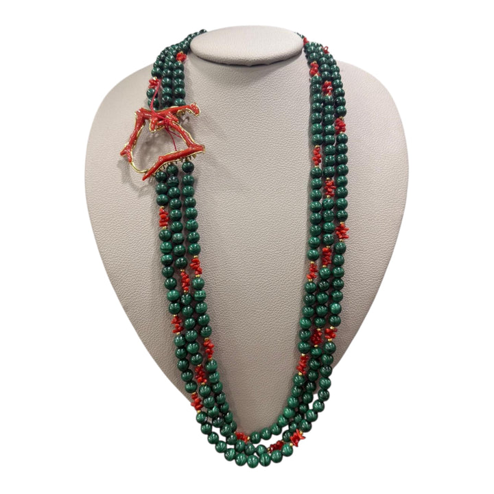 Multi-strand necklace of malachite and coral set in silver